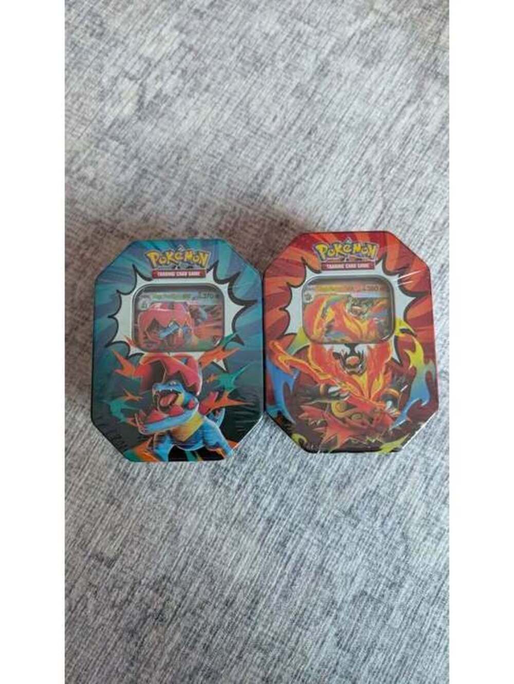 Ascended Heroes Pokémon Trading Card Game Mega Feraligatr and Mega Emboar Tins